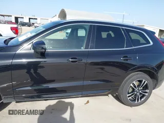 2020 Volvo XC60 Momentum z VIN YV4102RK9L1474206, wystawiony jako IAAI lot #41731881 z przebiegiem 77 908 mil mil oraz . Historia ofert i sprzedaży dostępna na DreamBid. Obrazek 14.