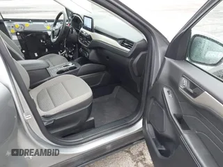 2022 Ford Escape SE z VIN 1FMCU0G62NUB32670, wystawiony jako IAAI lot #42259177 z przebiegiem 67 692 mil mil oraz . Historia ofert i sprzedaży dostępna na DreamBid. Obrazek 5.