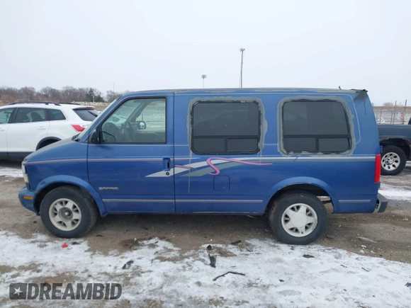 1997 GMC Safari z VIN 1GDDM19W0VB545092, wystawiony jako IAAI lot #41572568 z przebiegiem Nie podano mil oraz . Historia ofert i sprzedaży dostępna na DreamBid. Obrazek 13.
