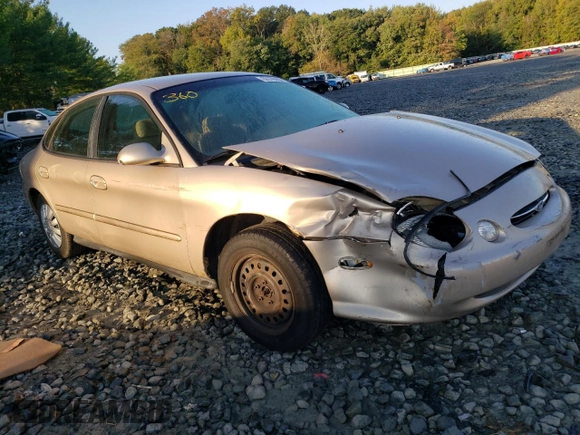 1999 Ford Taurus SE z VIN 1FAFP53U9XG107489, wystawiony jako Copart lot #69576093 z przebiegiem 86 262 mil mil oraz Szkody całkowita. Historia ofert i sprzedaży dostępna na DreamBid. Obrazek 4.