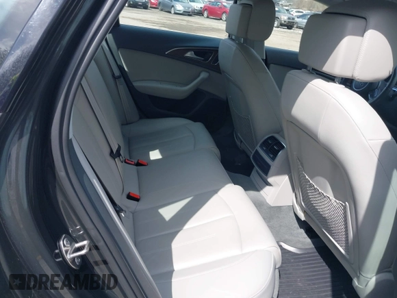 2016 Audi A6 2.0T Premium Plus with VIN WAUGFAFC7GN095669, listed as a IAAI auction lot 41894313 with 84,725 mi miles. Bid and sale history available at carsss.com. Image 8.
