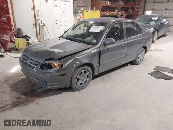 2004 Hyundai Accent GL with VIN KMHCG45C44U528783, listed as a IAAI auction lot 41535104 with 1 mi miles. Bid and sale history available at carsss.com. Image 17.