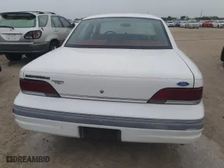 1992 Ford Crown Victoria LX with VIN 2FALP74W6NX244444, listed as a Copart auction lot 81193284 with 11,776 mi miles and Salvage Title. Bid and sale history available at carsss.com. Image 6.