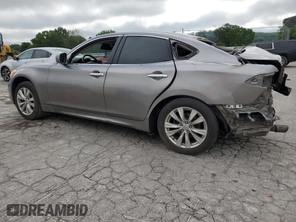 2013 Infiniti M with VIN JN1BY1AR2DM601965, listed as a Copart auction lot 62014215 with 134,047 mi miles and Salvage title. Bid and sale history available at DreamBid. Image 2.