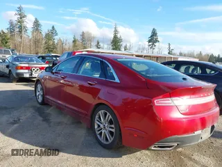 2014 Lincoln MKZ z VIN 3LN6L2GK6ER828030, wystawiony jako IAAI lot #41732835 z przebiegiem 172 978 mil mil oraz . Historia ofert i sprzedaży dostępna na DreamBid. Obrazek 3.