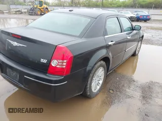 2010 Chrysler 300 Touring with VIN 2C3CA5CV5AH144949, listed as a IAAI auction lot 41955931 with 236,658 mi miles. Bid and sale history available at carsss.com. Image 4.