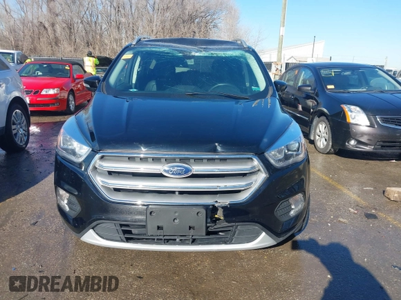 2017 Ford Escape Titanium with VIN 1FMCU0J94HUD58815, listed as a IAAI auction lot 41455415 with 80,421 mi miles and . Bid and sale history available at DreamBid. Image 13.
