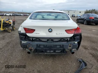 2015 BMW 6 Series 640i xDrive z VIN WBA6B8C56FD453175, wystawiony jako Copart lot #81372044 z przebiegiem 111 835 mil mil oraz Czysty tytuł • Clean title. Historia ofert i sprzedaży dostępna na DreamBid. Obrazek 6.