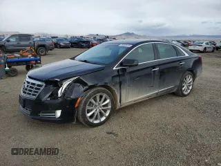 2014 Cadillac XTS Luxury with VIN 2G61M5S3XE9177636, listed as a Copart auction lot 49508415 with 65,717 mi miles and Salvage title. Bid and sale history available at DreamBid. Image 1.