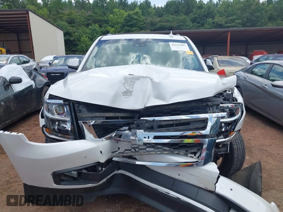 2016 Chevrolet Tahoe LT with VIN 1GNSCBKC9GR459057, listed as a IAAI auction lot 42541097 with 82,203 mi miles and . Bid and sale history available at DreamBid. Image 6.