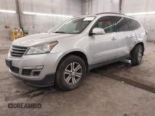 2015 Chevrolet Traverse LT with VIN 1GNKVHKD4FJ305990, listed as a IAAI auction lot 41441938 with 203,877 mi miles and . Bid and sale history available at DreamBid. Image 2.