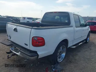 2001 Ford F-150 XLT with VIN 1FTRW07L81KE91672, listed as a IAAI auction lot 42021661 with 200,000 mi miles and . Bid and sale history available at DreamBid. Image 4.