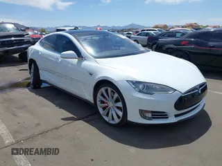 2014 Tesla Model S 60 z VIN 5YJSA1H13EFP33659, wystawiony jako IAAI lot #42101491 z przebiegiem 113 460 mil mil oraz . Historia ofert i sprzedaży dostępna na DreamBid. Obrazek 1.
