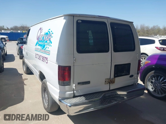 2006 Ford Econoline Cargo with VIN 1FTSE34L76DB20959, listed as a IAAI auction lot 41791345 with 412,774 mi miles and . Bid and sale history available at DreamBid. Image 3.