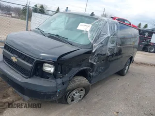 2016 Chevrolet Express Cargo Van with VIN 1GCWGAFGXG1260362, listed as a IAAI auction lot 41813990 with 141,741 mi miles. Bid and sale history available at carsss.com. Image 2.