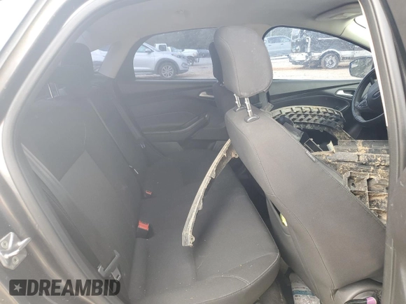 2016 Ford Focus SE z VIN 1FADP3F2XGL253736, wystawiony jako Copart lot #51758415 z przebiegiem 137 904 mil mil oraz Szkoda całkowita • Salvage title. Historia ofert i sprzedaży dostępna na DreamBid. Obrazek 10.