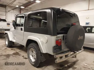 2005 Jeep Wrangler Unlimited with VIN 1J4FA44S05P359173, listed as a IAAI auction lot 41275179 with 75,035 mi miles. Bid and sale history available at carsss.com. Image 3.