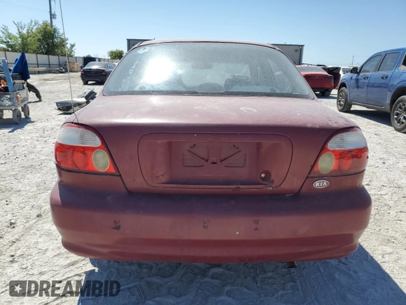 2001 Kia Sephia z VIN KNAFB121115074609, wystawiony jako Copart lot #72346144 z przebiegiem 88 400 mil mil oraz Czysty tytuł • Clean title. Historia ofert i sprzedaży dostępna na DreamBid. Obrazek 6.