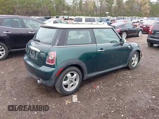 2009 MINI Cooper Hardtop with VIN WMWMF33579TW72493, listed as a IAAI auction lot 41861584 with 136,341 mi miles. Bid and sale history available at carsss.com. Image 4.