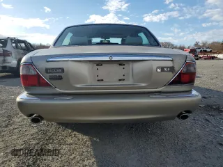 1998 Jaguar XJ with VIN SAJHX1248WC853422, listed as a Copart auction lot 80614724 with 76,269 mi miles and Non repairable. Bid and sale history available at DreamBid. Image 6.