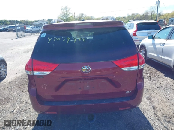 2014 Toyota Sienna XLE with VIN 5TDYK3DC8ES457940, listed as a IAAI auction lot 42039472 with 99,769 mi miles and . Bid and sale history available at DreamBid. Image 16.