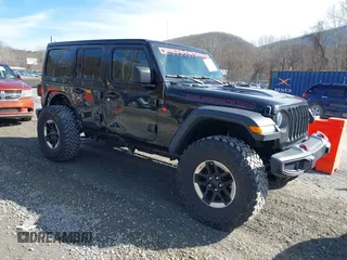 2020 Jeep Wrangler Unlimited Rubicon with VIN 1C4HJXFN7LW176069, listed as a IAAI auction lot 41575766 with 57,830 mi miles. Bid and sale history available at carsss.com. Image 1.