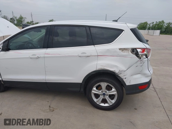 2016 Ford Escape SE z VIN 1FMCU0G79GUC41641, wystawiony jako IAAI lot #42103256 z przebiegiem 153 792 mil mil oraz . Historia ofert i sprzedaży dostępna na DreamBid. Obrazek 6.