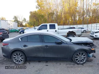 2021 Mazda 3 Preferred with VIN 3MZBPBCL7MM200461, listed as a IAAI auction lot 40614402 with 67,261 mi miles and . Bid and sale history available at DreamBid. Image 14.