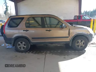 2002 Honda CR-V LX z VIN JHLRD78512C007757, wystawiony jako IAAI lot #41885302 z przebiegiem 177 892 mil mil oraz . Historia ofert i sprzedaży dostępna na DreamBid. Obrazek 13.