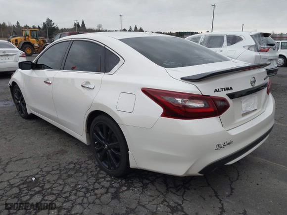2018 Nissan Altima 2.5 SV with VIN 1N4AL3AP4JC158095, listed as a IAAI auction lot 41155838 with 79,504 mi miles. Bid and sale history available at carsss.com. Image 3.