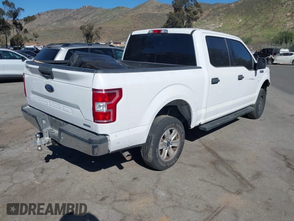 2018 Ford F-150 XL with VIN 1FTEW1CP0JKC28072, listed as a IAAI auction lot 41558764 with 153,402 mi miles. Bid and sale history available at carsss.com. Image 4.