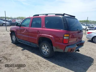 2005 Chevrolet Tahoe LT z VIN 1GNEK13T25R261555, wystawiony jako IAAI lot #42060225 z przebiegiem 151 190 mil mil oraz . Historia ofert i sprzedaży dostępna na DreamBid. Obrazek 3.