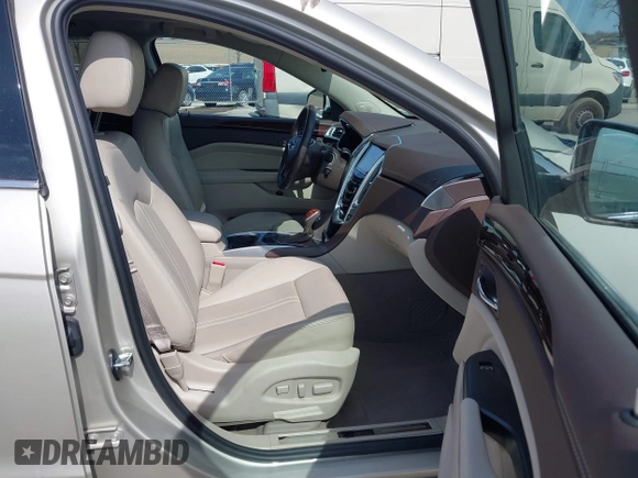 2015 Cadillac SRX Luxury Collection with VIN 3GYFNEE32FS638242, listed as a IAAI auction lot 41866683 with 32,277 mi miles. Bid and sale history available at carsss.com. Image 5.