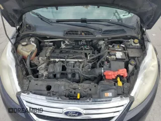 2012 Ford Fiesta SE z VIN 3FADP4BJ8CM194262, wystawiony jako Copart lot #56685845 z przebiegiem 367 579 mil mil oraz Szkoda całkowita • Salvage title. Historia ofert i sprzedaży dostępna na DreamBid. Obrazek 11.