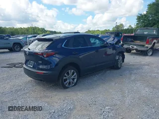 2022 Mazda CX-30 S Select with VIN 3MVDMBBL6NM448268, listed as a IAAI auction lot 42242290 with Not provided miles and . Bid and sale history available at DreamBid. Image 4.