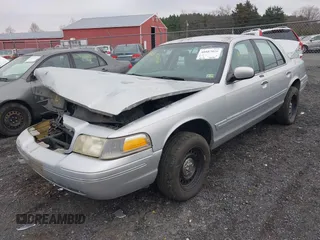 2003 Ford Crown Victoria LX z VIN 2FAFP74W53X151974, wystawiony jako IAAI lot #40887020 z przebiegiem 186 149 mil mil oraz . Historia ofert i sprzedaży dostępna na DreamBid. Obrazek 2.