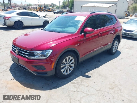 2018 Volkswagen Tiguan S with VIN 3VV1B7AX4JM043324, listed as a IAAI auction lot 42623550 with 62,858 mi miles and . Bid and sale history available at DreamBid. Image 2.