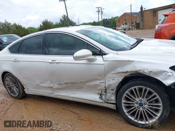 2015 Ford Fusion SE with VIN 3FA6P0HD9FR123677, listed as a IAAI auction lot 42021493 with 166,446 mi miles and . Bid and sale history available at DreamBid. Image 13.