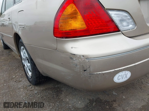 2001 Toyota Avalon XL z VIN 4T1BF28B41U172837, wystawiony jako IAAI lot #42350664 z przebiegiem 150 111 mil mil oraz . Historia ofert i sprzedaży dostępna na DreamBid. Obrazek 13.