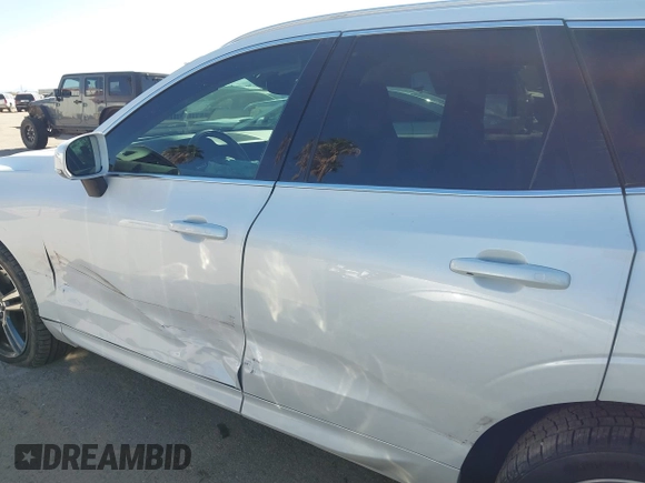 2020 Volvo XC60 Momentum with VIN YV4A22RK6L1553603, listed as a IAAI auction lot 41103991 with 67,509 mi miles and . Bid and sale history available at DreamBid. Image 14.
