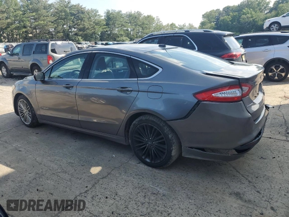 2013 Ford Fusion SE Hybrid with VIN 3FA6P0LU8DR126848, listed as a Copart auction lot 61544925 with 237,115 mi miles and Salvage title. Bid and sale history available at DreamBid. Image 2.