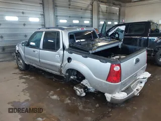 2004 Ford Explorer Sport Trac XLS z VIN 1FMZU77K84UB99207, wystawiony jako IAAI lot #41621860 z przebiegiem 126 634 mil mil oraz . Historia ofert i sprzedaży dostępna na DreamBid. Obrazek 3.