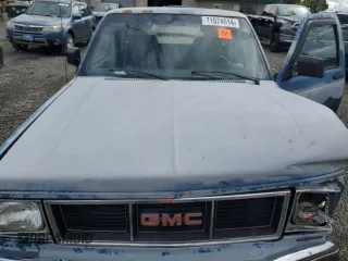1990 GMC Sonoma z VIN 1GTCS19Z4L8502532, wystawiony jako Copart lot #71074514 z przebiegiem 148 195 mil mil oraz Szkody całkowita. Historia ofert i sprzedaży dostępna na DreamBid. Obrazek 11.