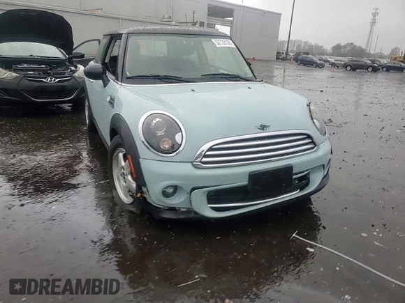2011 MINI Hardtop with VIN WMWSU3C57BT096973, listed as a Copart auction lot 52726185 with 90,545 mi miles and Salvage title. Bid and sale history available at DreamBid. Image 11.