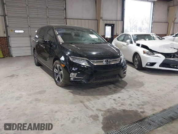 2018 Honda Odyssey Touring with VIN 5FNRL6H87JB105410, listed as a IAAI auction lot 41860707 with 91,908 mi miles. Bid and sale history available at carsss.com. Image 1.