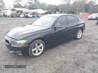 2015 BMW 3 Series 328i with VIN WBA3A5C5XFF608822, listed as a IAAI auction lot 41439719 with 71,830 mi miles. Bid and sale history available at carsss.com. Image 2.