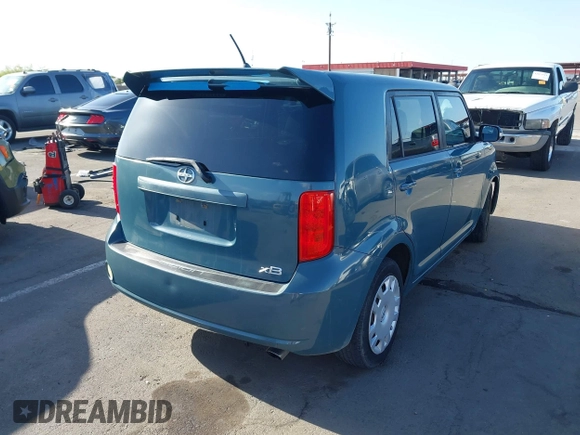 2009 Scion xB with VIN JTLKE50EX91094466, listed as a IAAI auction lot 42068298 with 236,237 mi miles. Bid and sale history available at carsss.com. Image 4.