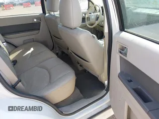 2010 Mercury Mariner Premier with VIN 4M2CN8HG5AKJ07771, listed as a IAAI auction lot 41779514 with 187,786 mi miles and . Bid and sale history available at DreamBid. Image 8.