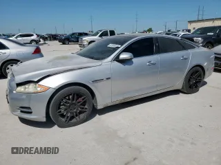 2012 Jaguar XJ with VIN SAJWA1CB0CLV23002, listed as a Copart auction lot 52804915 with 149,331 mi miles and Salvage Title. Bid and sale history available at DreamBid. Image 1.