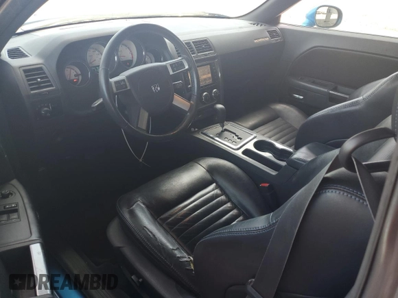 2009 Dodge Challenger R/T z VIN 2B3LJ54T29H635811, wystawiony jako Copart lot #57065925 z przebiegiem 207 261 mil mil oraz Czysty tytuł • Clean title. Historia ofert i sprzedaży dostępna na DreamBid. Obrazek 8.
